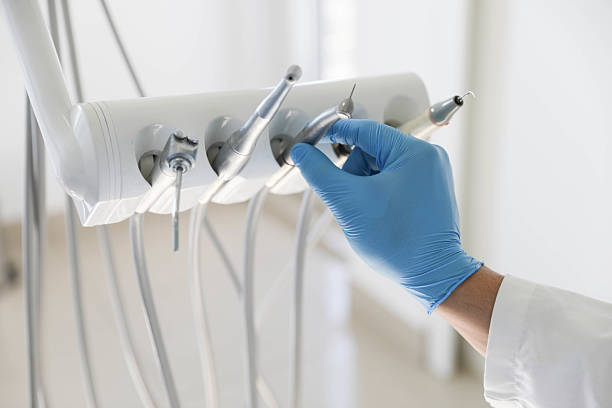 Professional Dental Implants technician working in Leslie, MI